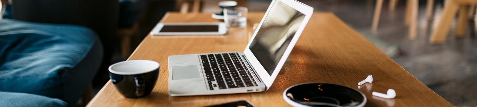 Laptop and devices on a table